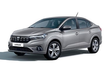 A silver Dacia Logan sedan is shown in a studio shot, angled slightly to the left, showcasing its front and side profile.